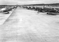 Asisbiz Curtiss P 40N Kittyhawk RAAF 75Sqn line up at dispersal area PNG 01