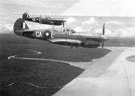 Asisbiz USAAF 44 7924 Curtiss P 40N Kittyhawk RAAF 75Sqn GAL A29 1075 and GAG over PNG 02