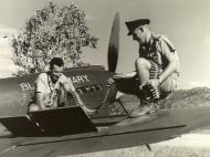 Asisbiz Curtiss P 40E Kittyhawk RAAF 76Sqn IR Bloody Mary A29 78 being rearmed Townsville Queensland Apr 1942 AWM 012733