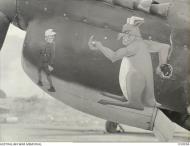 Asisbiz Curtiss P 40 Kittyhawk RAAF 77Sqn nose art at Vivigani Goodenough Isd Papua New Guinea AWM OG0054