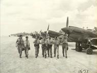 Asisbiz Curtiss P 40N Kittyhawk RAAF 78Sqn pilots returning from their mission Noemfoor DNG 28th Aug 1944 AWM OG1571