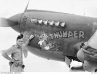 Asisbiz Curtiss P 40N Kittyhawk RAAF 80Sqn BUS FLt John Noel Ollivier A29 651 Thumper at Kamiri Noemfoor DNG Aug 1944 AWM OG1545