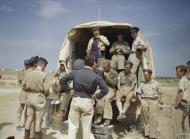 Asisbiz Aircrew RAF 112Sqn staff discussing their current mission in the Western desert IWM TR976