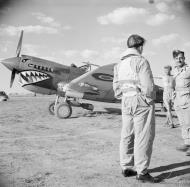 Asisbiz Curtiss Kittyhawk MkIII RAF 112Sqn prior to take off from Foggia Italy IWM NA7930