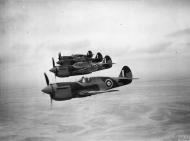 Asisbiz Curtiss P 40E Kittyhawks RAF 94Sqn AK681 during a familiarisation flight Western Desert IWM ME(RAF)3391