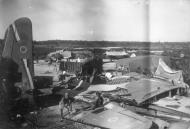 Asisbiz RNZAF Kittyhawk wings with a lone Hundson airframe at a Pacific scrapyard 01