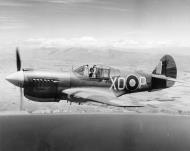Asisbiz USAAF 41 36415 Curtiss P 40E Kittyhawk RNZAF 16Sqn XOP NZ3044 over the Marlborough coast NZ 01
