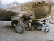 Asisbiz Curtiss P 40 Warhawk ground crew loading up one of their aircraft for Operation Strangle Italy NARA A53502AC