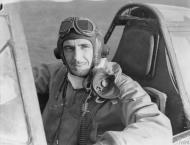 Asisbiz Aircrew USAAF 361FG unknown pilot in his P 47D Thunderbolt 14th Mar 1944 FRE525