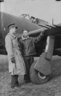 Asisbiz 41 6209 P 47C Thunderbolt 56FG62FS 4FG334FS QP War correspondent Gladwin Hill is shown the armament FRE2478