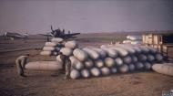 Asisbiz P 47 Thunderbolt 56FG63FS stockpile of drop fuel tanks at Halesworth 1944 FRE5564