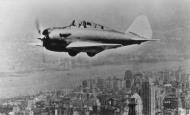 Asisbiz SEV XP (an early P 47D Thunderbolt) in flight over New York City FRE9108