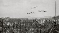 Asisbiz 352FG P 51D Mustangs fly in formation low over a English town as they form up for a misssion 1944 01