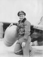 Asisbiz Aircrew USAAF 357FG Lt Col Thomas Hayes Jr stands with a P 51 Mustang Aug 1944 FRE481