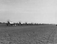 Asisbiz P 51D Mustangs 357FG lining up for take off Engalnd 1944 01