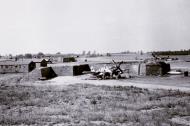 Asisbiz P 51B Mustang 4FG334FS QP undergoing maintenance in a revetment at Debden 1944 01