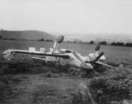 Asisbiz P 51D Mustang 4FG334FS QPY on its back after a forced landing mishap 1944 FRE2281