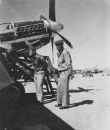 Asisbiz Major General Claire L Chennault and Brig General Edgar E Glenn inspect engine repairs in Kunming China 3rd Nov 1944 01