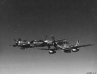 Asisbiz 44 63423 P 51D Mustang 7AF 15FG47FS 15 Squirt Col James O Beckwith CO leads Mustangs of the 45FS over Saipan 1945 02