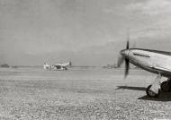 Asisbiz P 51D Mustang 7AF 15FG taxiing at Iwo Jima Mar 1945 01