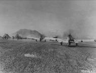 Asisbiz P 51D Mustang 7AF 15FG45FS showing the stripped markings from behind Iwo Jima 1945 01