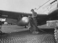 Asisbiz P 51D Mustang 7AF 21FG46FS The Gator refueling the 100 gallon drop tank at Iwo Jima 1945 01