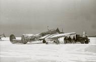 Asisbiz Petlyakov Pe 2R ORPS unit Red 7 in winter camouflage being refueled Winter 1941 42 01