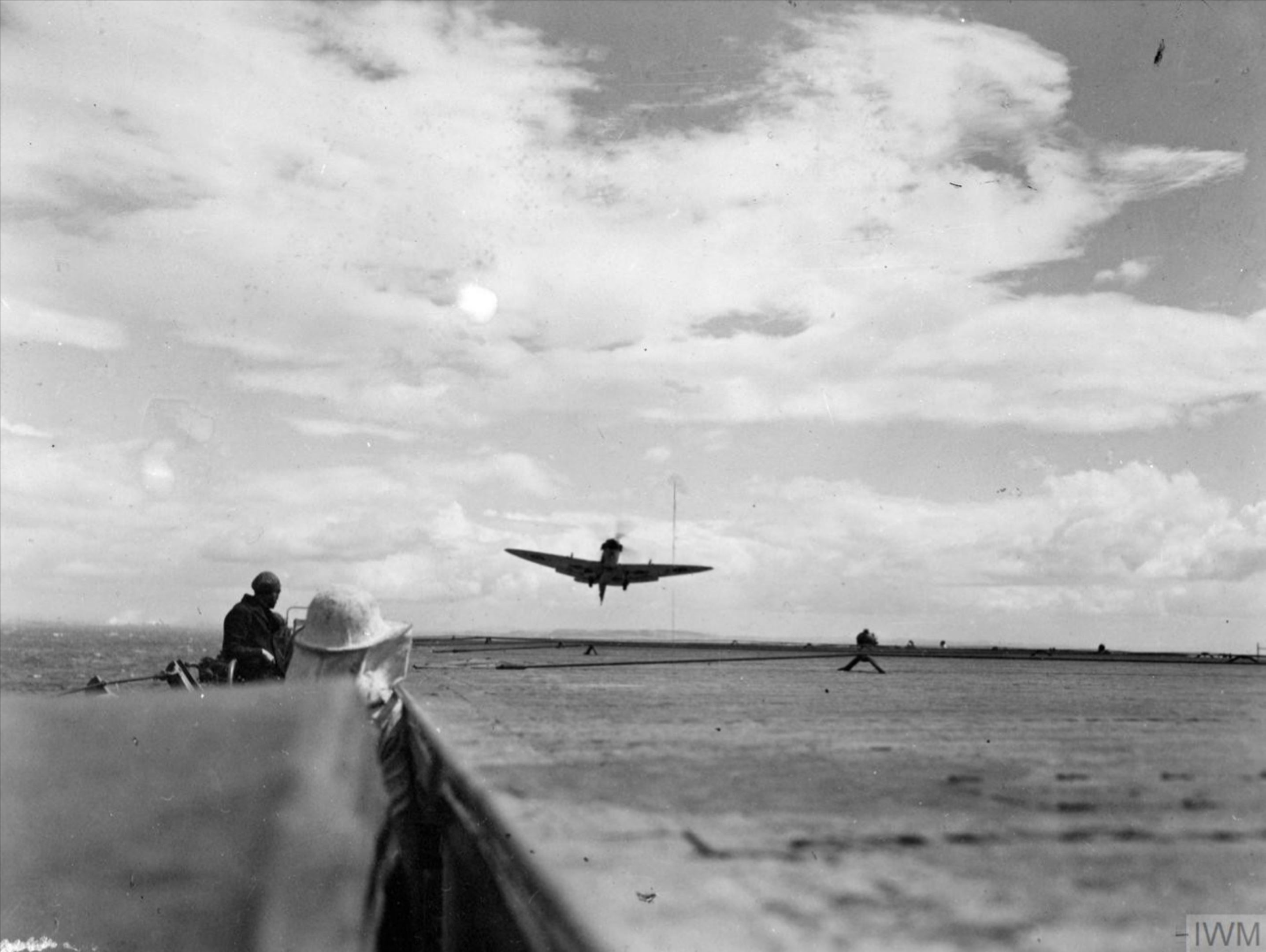 Fleet Air Arm Seafire landing aboard HMS Hunter off Salerno Bay Sep 1943 IWM A19536