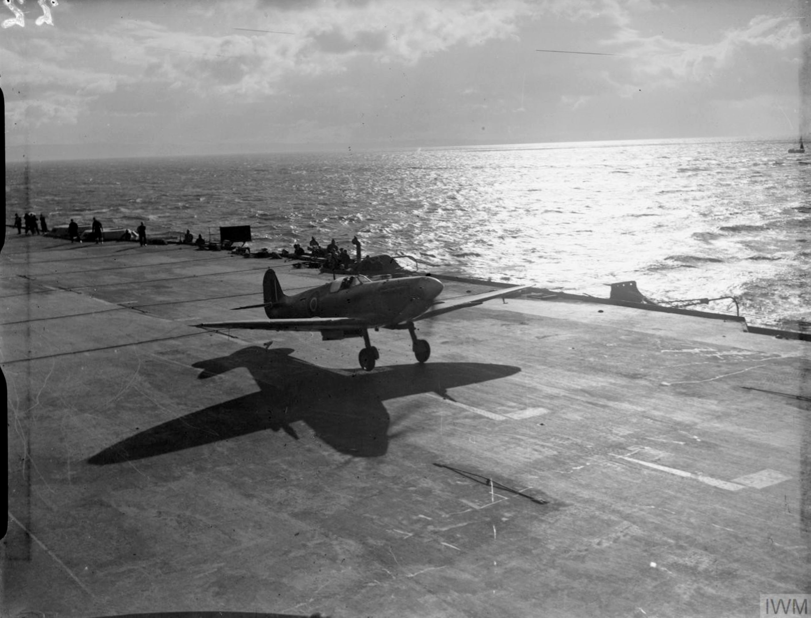 Fleet Air Arm Seafire taking off from HMS Illustrious IWM A14863