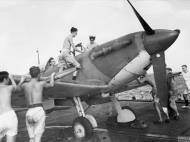 Asisbiz Fleet Air Arm 834NAS Seafire being refuelling aboard HMS Battler Dec 1943 IWM A21631