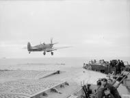 Asisbiz Fleet Air Arm 880NAS Seafire IIc Red 7L taking off from HMS Furious Aug 1944 IWM A25072