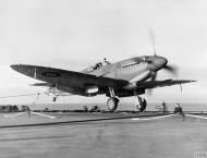 Asisbiz Fleet Air Arm Seafire XV landing aboard HMS Pretoria Castle Nov 1944 IWM A26685