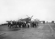 Asisbiz Fleet Air Arm Seafire aboard HMS Argus off Lamlash Scotland Aug 1943 IWM A18883