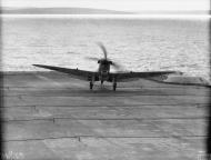 Asisbiz Fleet Air Arm Seafire landing aboard HMS Victoriuos Scotland 23 25th Sep 1942 IWM A12123