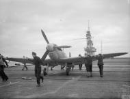 Asisbiz Fleet Air Arm Seafire on the deck of HMS Tracker in the North Atlantic Sep Oct 1943 IWM A19710