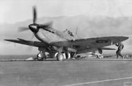 Asisbiz Fleet Air Arm Seafire taking off from HMS Illustrious off Clyde Scotland Feb 1943 IWM A20651