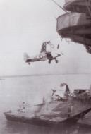 Asisbiz Fleet Air Arm Seafires being loaded onto their carrier 01