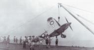 Asisbiz Fleet Air Arm Seafires being loaded onto their carrier 02