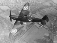 Asisbiz Spitfire 1 Prototype K5054 in flight over England 1939 IWM HU1660