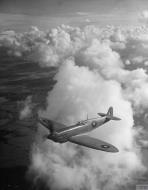 Asisbiz Spitfire PR9 being flown by Jeffrey Quill Chief Test Pilot IWM EMOS1325