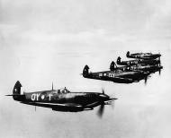Asisbiz Spitfires LFVIII RAAF 452Sqn QYT QYB QYE QYS and QYA in formation Halmahera area 30th Dec 1994 01