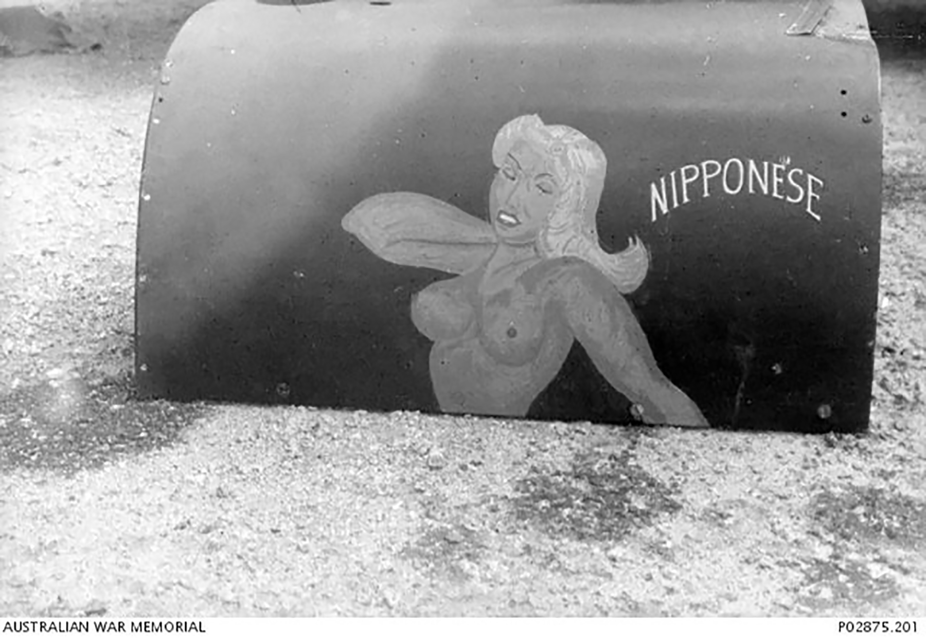 Spitfire MkVc RAAF 79Sqn Nipponese nose art at Kiriwina Trobriand Islands PNG Sep 1943 IWM 01