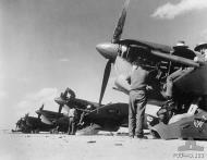 Asisbiz Spitfire MkVcTrop RAAF 451Sqn being serviced El Daba Egypt 1943 01