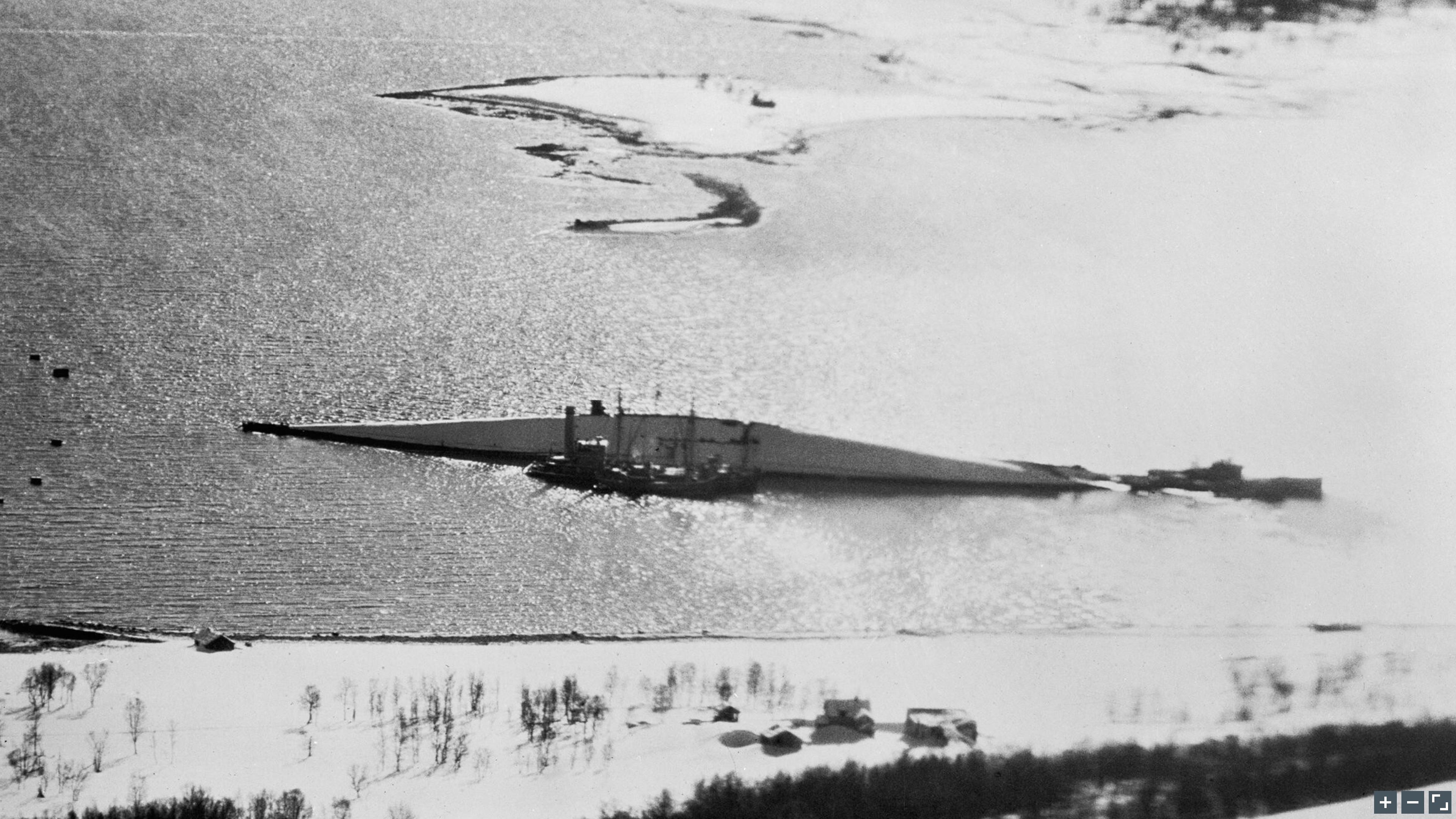 Mosquito PRXVI RAF 544Sqn NS637 showing the capsized German battleship Tirpitz in Tromso fjord IWM C5148