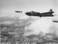 Asisbiz Spitfire MkIX RAF 302Sqn WXR MH869 escorts 8AF B 17 Fortress over France early 1944 01