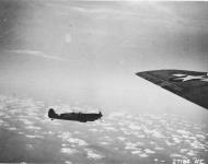 Asisbiz Spitfire MkIX RAF 302Sqn WXR MH869 escorts 8AF B 17 Fortress over France early 1944 02