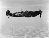 Asisbiz Spitfire MkIX RAF 302Sqn WXR MH869 escorts 8AF B 17 Fortress over France early 1944 04