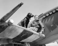 Asisbiz Aircrew RAF Ace JE Johnnie Johnson in his Spitfire MkIX RAF 144 (Canadian) Wing Bazenville Normandy 01