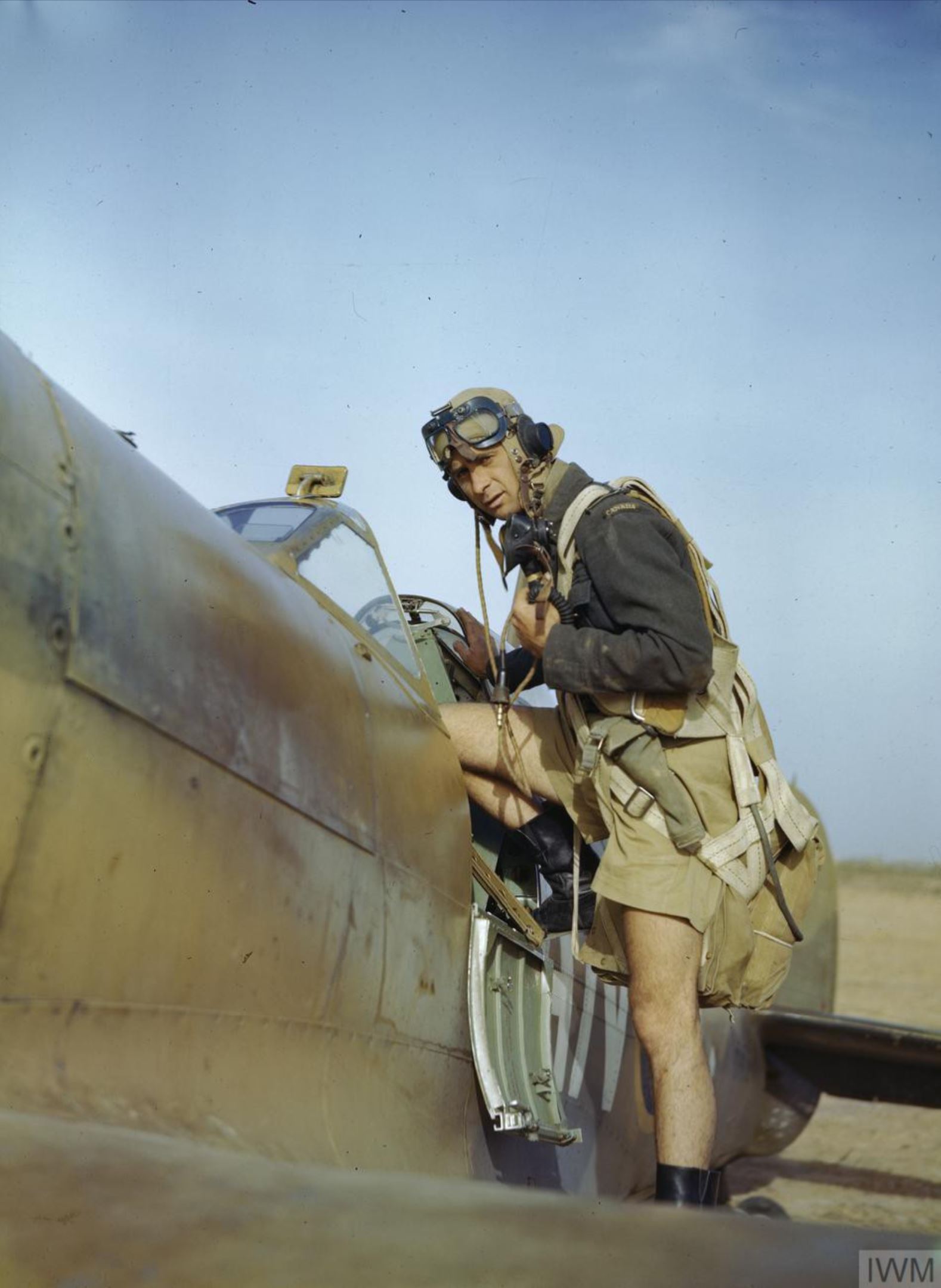 Aircrew-RCAF-417Sqn-pilot-about-to-embark-on-a-mission-Goubrine-Tunisia-April-1943-IWM-TR832.jpg