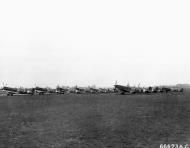 Asisbiz Spitfires LFIX RNZAF 485Sqn OUS OUY OUP OUJ OUA OUL OUH and OUM at RAF Station 112 England 30th Mar 1944 01